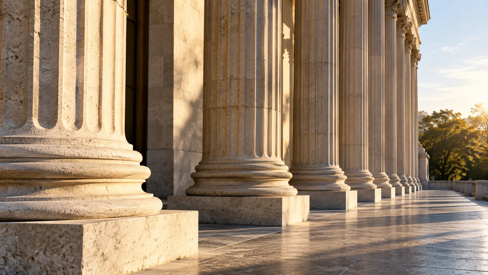 Warm limestone columns along a civic building