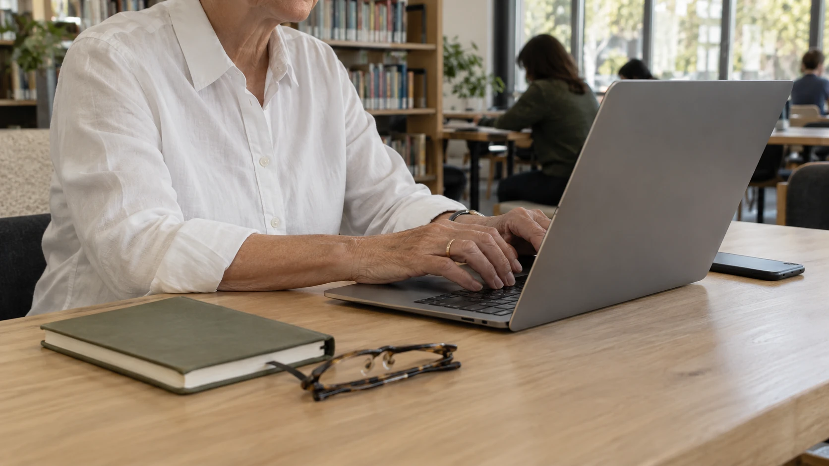 Writing a message from a library worktable